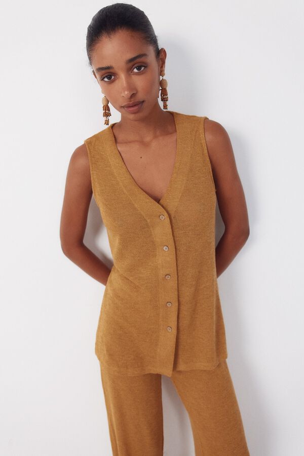 Conjunto de colete e cal&ccedil;as