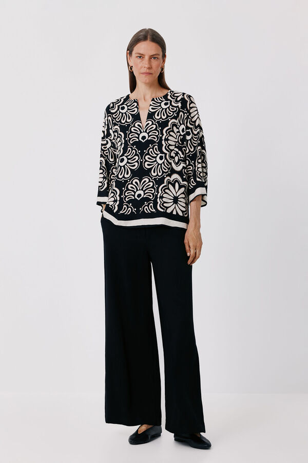 Conjunto de cal&ccedil;a e blusa