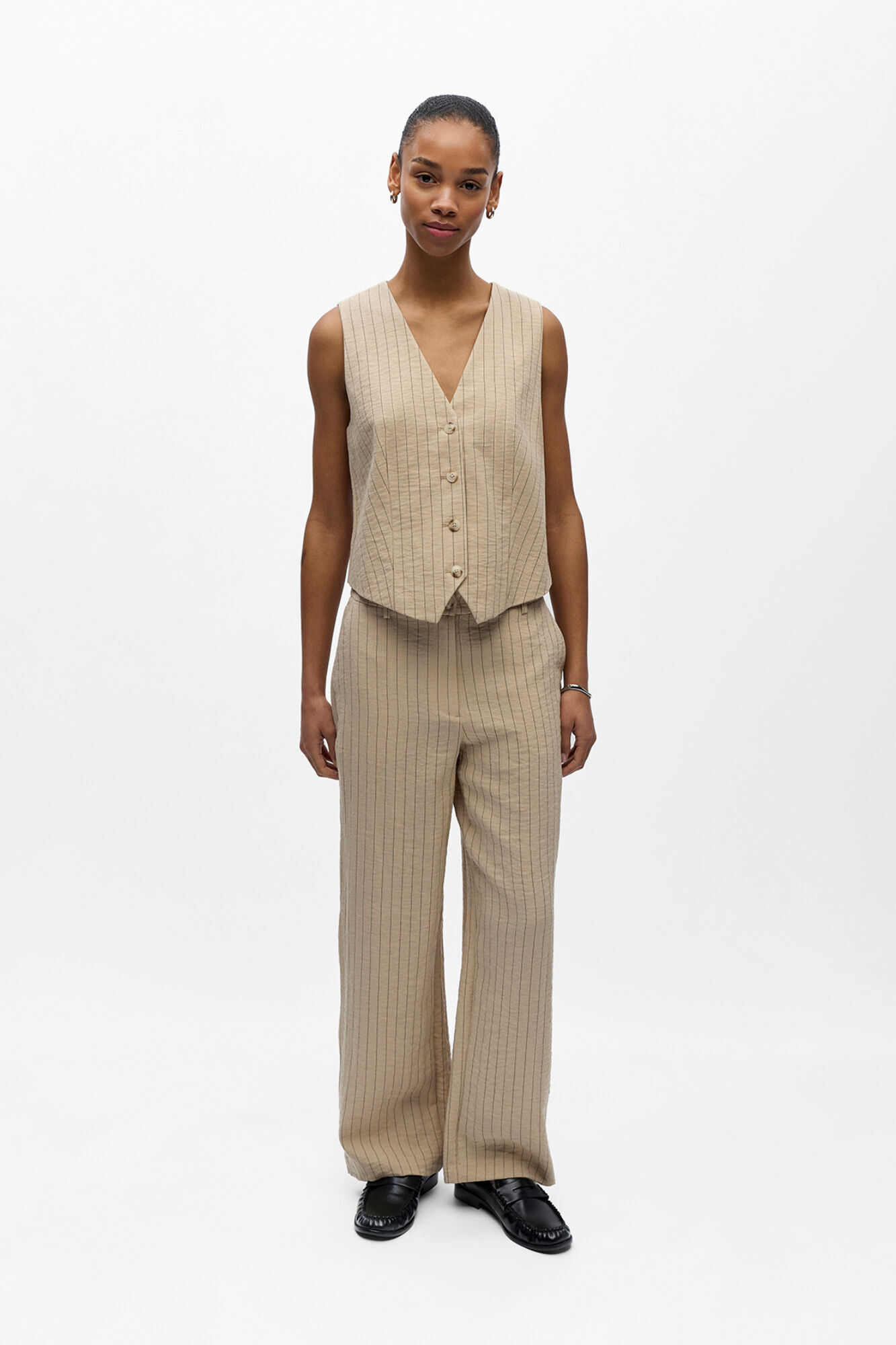 Conjunto de colete e cal&ccedil;a