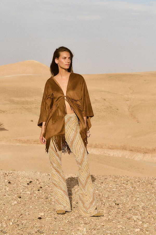 Conjunto de pele, bota e cal&ccedil;as