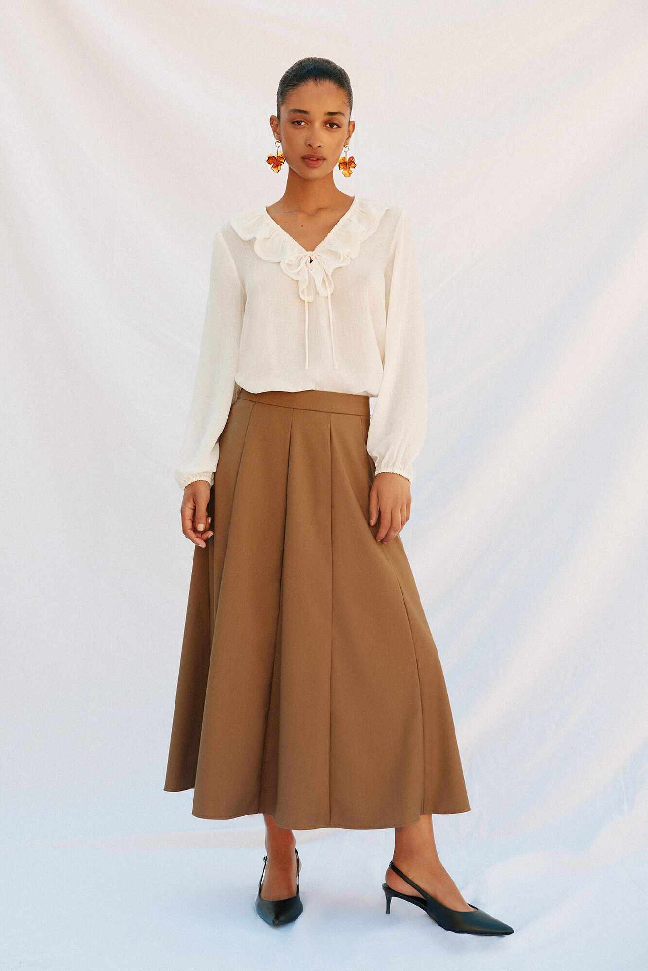 Conjunto de falda y blusa